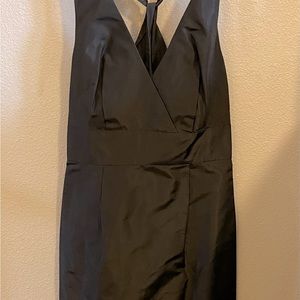 J.Crew Silk Black Dress, size 4. Crossover neckline with straps twisting in back